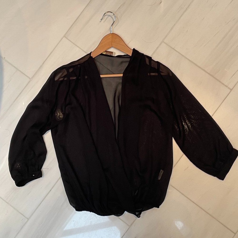 Sheer black blouse